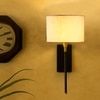Devansh Metal Electric Wall Light in Black Colour with Off-white Shade Count of 1 Light