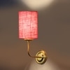 Devansh Metal Electric Wall Light in Gold Colour with Pink Shade Count of 1 Light