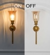 Abbie Single Light Wall Fitting In Antique Brass Finish Metal With Amber Glass