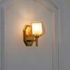 Morvah Single Light Brass Wall Fitting with Amber Glass