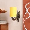 Devansh Metal Electric Wall Light in Antique Gold Colour with Yellow Shade Count of 1 Light
