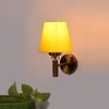 Devansh Metal Electric Wall Light in Gold Colour with Yellow Shade Count of 1 Light