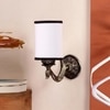 Devansh Metal Electric Wall Light in Antique Gold Colour with White & Black Shade Count of 1 Light
