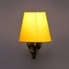 Devansh Metal Electric Wall Light in Antique Gold Colour with Yellow Shade Count of 1 Light
