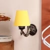 Devansh Metal Electric Wall Light in Antique Gold Colour with Yellow Shade Count of 1 Light
