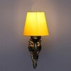 Devansh Metal Electric Wall Light in Antique Gold Colour with Yellow Shade Count of 1 Light