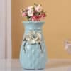 Light Green Ceramic Vase with Flower design