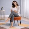 Doe Buck Luna Boucle Round Ottoman Stool in Rust Colour with Black Metal Legs