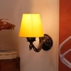Devansh Metal Electric Wall Light in Antique Gold Colour with Yellow Shade Count of 1 Light
