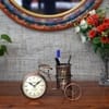 Desert Art Metal Handpainted Cycle Pen Stand with Clock in Golden Finish