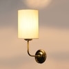 Devansh Metal Electric Wall Light in Gold Colour with off-white Shade Count of 1 Light