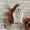 Devansh Solid Wood Electric Wall Light in Brown Colour with Multi Shade Count of 1 Light