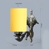 Devansh Metal Electric Wall Light in Antique Gold Colour with Yellow Shade Count of 1 Light