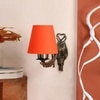 Devansh Metal Electric Wall Light in Antique Gold Colour with Orange Shade Count of 1 Light