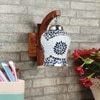 Devansh Solid Wood Electric Wall Light in Brown Colour with Multi Shade Count of 1 Light