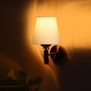 Devansh Metal Electric Wall Light in Gold Colour with off-white Shade Count of 1 Light