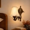 Devansh Metal Electric Wall Light in Gold Colour with Orange Shade Count of 1 Light