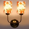 Devansh Metal Electric Wall Light in Gold Colour with Multi Shade Count of 2 Lights