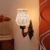 Devansh Metal Electric Wall Light in Antique Gold Colour with Beige Shade Count of 1 Light