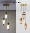 Isla 3 Light Ceiling Pendant In Brass Finish Metal With Amber And Frosted White Glass Shades