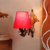 Devansh Metal Electric Wall Light in Antique Gold Colour with Red Shade Count of 1 Light
