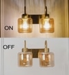 Hendrik 2 Light Wall Fitting In Brass Finish Metal With Amber Glass