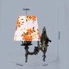 Devansh Metal Electric Wall Light in Antique Gold Colour with Multi Shade Count of 1 Light