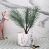 Attractive Faux Plant With White Ceramic Pot
