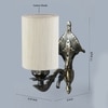 Devansh Metal Electric Wall Light in Antique Gold Colour with off-white Shade Count of 1 Light
