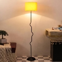 Magnolia Yellow Fabric Floor Lamp with Black Iron Base