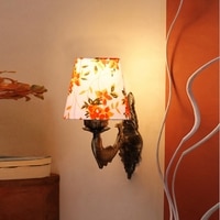 Devansh Metal Electric Wall Light in Antique Gold Colour with Multi Shade Count of 1 Light