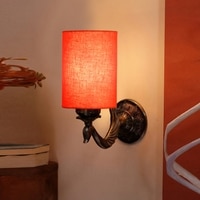 Devansh Metal Electric Wall Light in Antique Gold Colour with Orange Shade Count of 1 Light