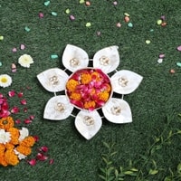 Small White And Gold Flower Urli In Gold Colour