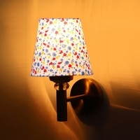 Devansh Metal Electric Wall Light in Gold Colour with Multi Shade Count of 1 Light