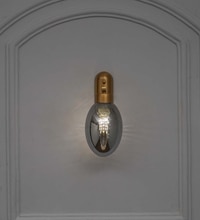 Zen Single Light Wall Fitting In Brass Finish Metal With Gray Glass