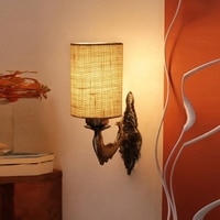 Devansh Metal Electric Wall Light in Antique Gold Colour with White Shade Count of 1 Light