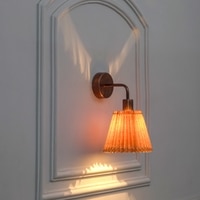 Huguenot Single Light Wall Fitting In Antique Copper Finish