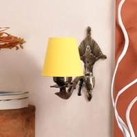 Devansh Metal Electric Wall Light in Antique Gold Colour with Yellow Shade Count of 1 Light