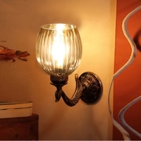 Devansh Metal Electric Wall Light in Antique gold Colour with Lavender Shade Count of 1 Light