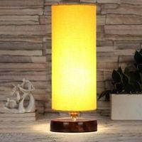 Shelby Yellow cotton table lamp with brown wood base