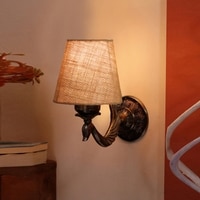 Devansh Metal Electric Wall Light in Antique Gold Colour with Beige Shade Count of 1 Light
