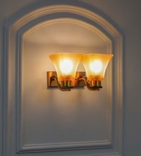 Sutton 2 Light Wall Fitting In Brass And  Black Finish Metal With White Glass