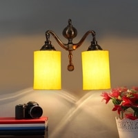 Devansh Metal Electric Wall Light in Yellow Colour with Yellow Shade Count of 2 Lights