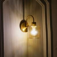 Hendrik Single Light Brass Wall Fitting with Amber Glass
