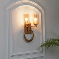 Pegasus 2 Light Wall Fitting In Brass Finish With Amber Glass Shade