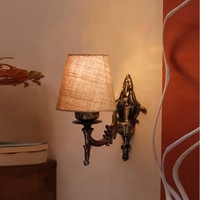 Devansh Metal Electric Wall Light in Antique Gold Colour with Beige Shade Count of 1 Light