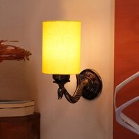 Devansh Metal Electric Wall Light in Antique Gold Colour with Yellow Shade Count of 1 Light