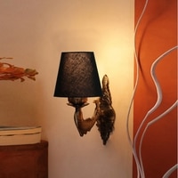 Devansh Metal Electric Wall Light in Antique Gold Colour with Black Shade Count of 1 Light