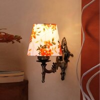 Devansh Metal Electric Wall Light in Antique Gold Colour with Multi Shade Count of 1 Light