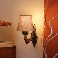 Devansh Metal Electric Wall Light in Antique Gold Colour with Beige Shade Count of 1 Light